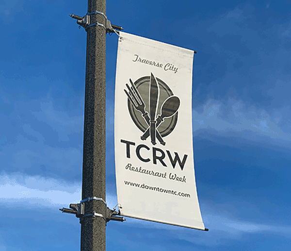 Light pole banner and brackets that says TC Restaurant Week