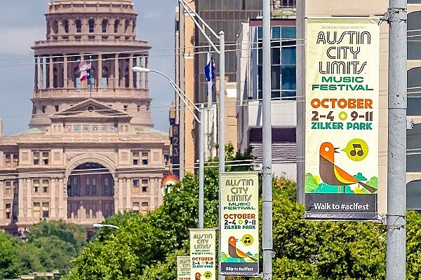 Banner saver brackets and custom banners lining the streets in Austin.